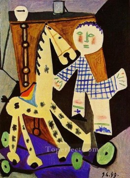 Claude a deux ans avec son cheval a roulettes 1949 Cubismo Pinturas al óleo